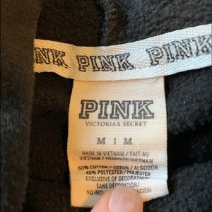 Victoria Secret’s Pink, black sweat shirt